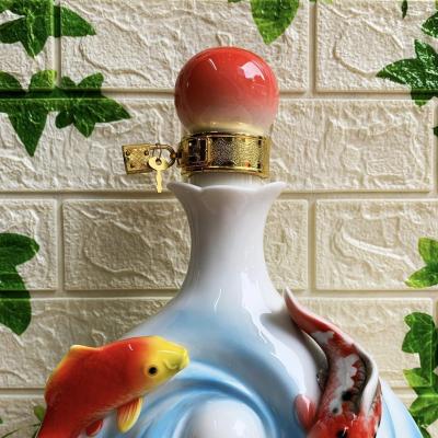 BÌNH CẢNH ĐỰNG RƯỢU BẰNG SỨ ĐẮP NỔI SEN CÁ